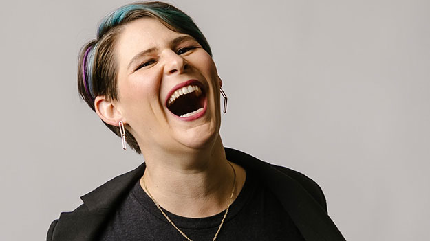 Erin team portrait from Drop the Mike Productions